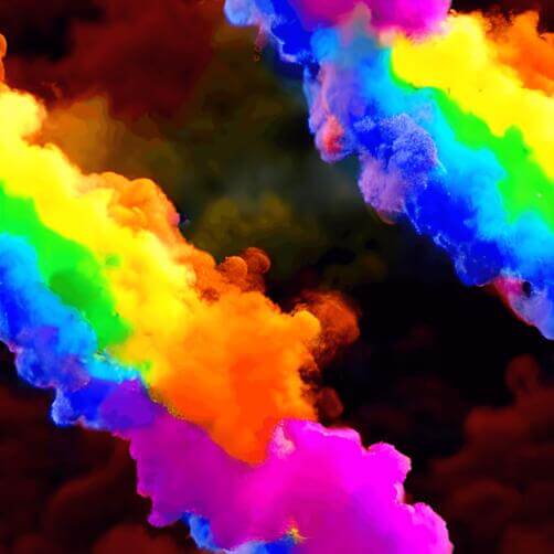 Rainbow-colored smoke floating in the air Rainbow-colored smoke floating in the air thumbnail