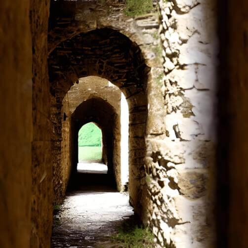 Narrow Passageway between Stone Arches Narrow Passageway between Stone Arches thumbnail