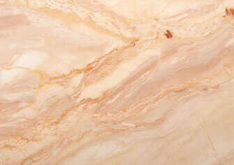 Close-up of Orange Marble Surface with Bird Perched Close-up of Orange Marble Surface with Bird Perched thumbnail