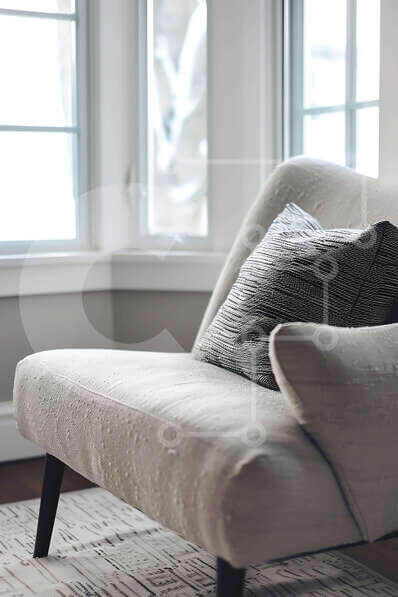 Cozy White Chair in Front of Open Window stock photo | Creative Fabrica