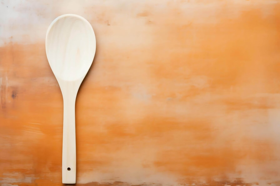 Download Wooden Spoon on Orange Background Backgrounds Online ...