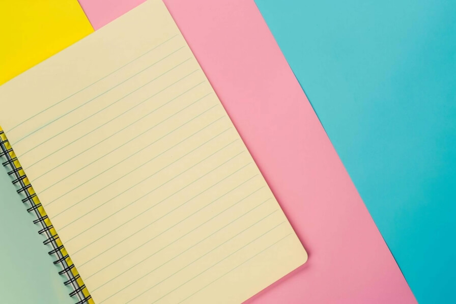 Download Yellow Spiral Notebook on Colorful Papers Backgrounds Online ...