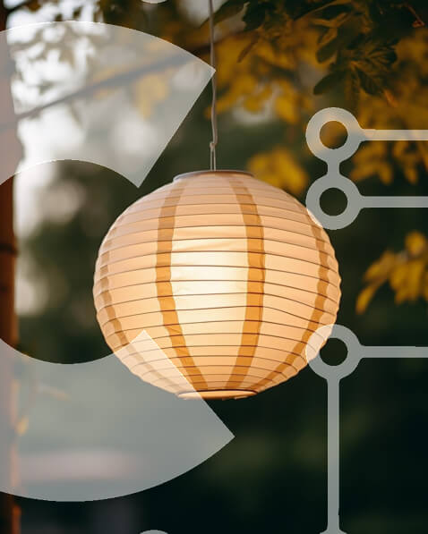 White Paper Lantern Hanging from Tree stock photo | Creative Fabrica