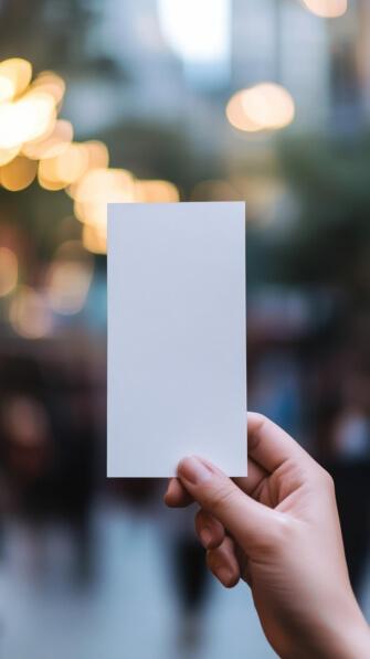 Download Hand Holding a Blank Card in a Blurred Background Mockups ...
