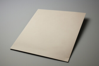 Blank Sheet of Paper on Grey Surface Blank Sheet of Paper on Grey Surface thumbnail
