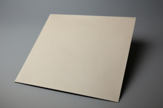 Flat Cream-colored Sheet on Gray Background Flat Cream-colored Sheet on Gray Background thumbnail