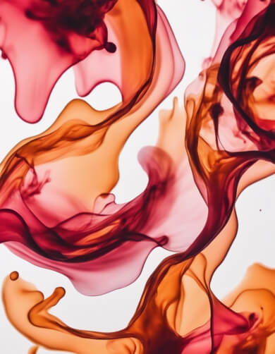 Abstrakte wirbelnde Farben in Rot und Orange Abstrakte wirbelnde Farben in Rot und Orange thumbnail