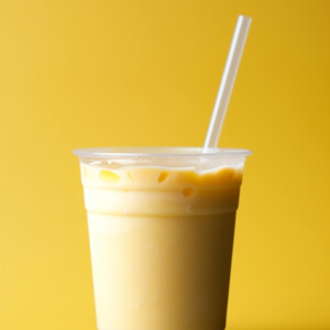Refreshing Beverage in Clear Cup with Yellow Background Sketches thumbnail
